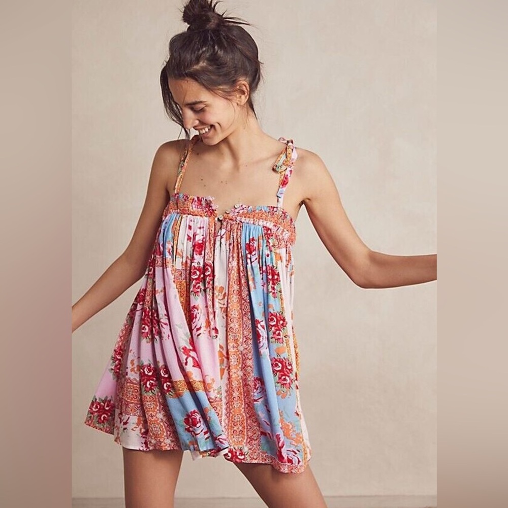 NWOT Free People Butterfly Romper size Medium. Pink Blue Sky Combo!